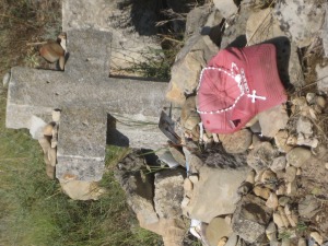 My old red hat and rosary along the Way in Spain.