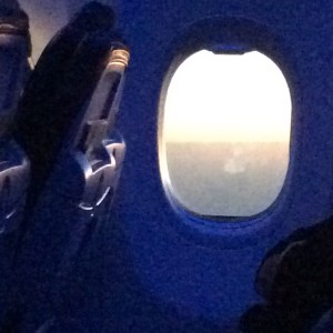Dawn showing across the aisle on the east side of our northbound 737.   